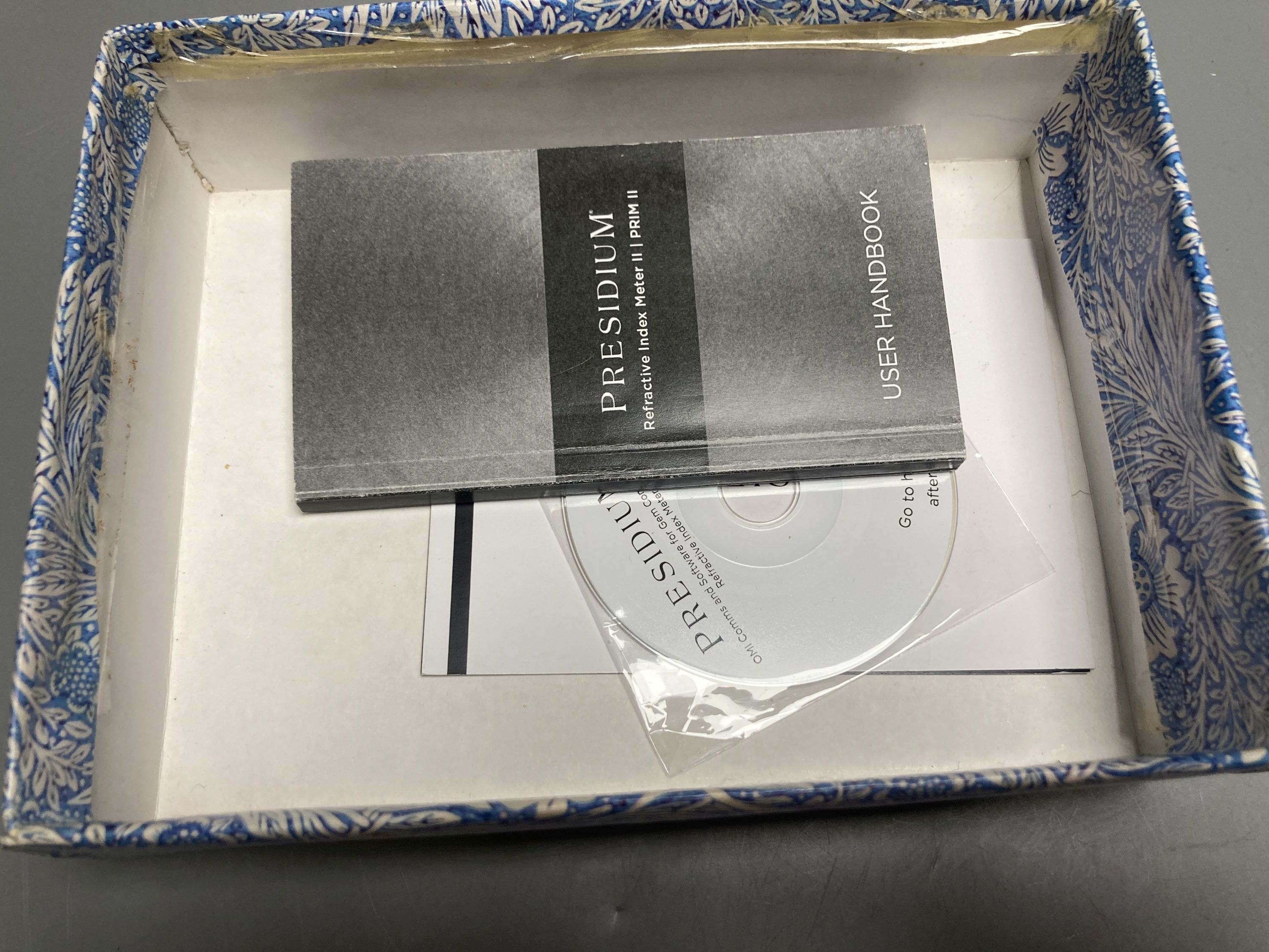 A cased Presidium Refractive Index Meter II, with user handbook and software disc.